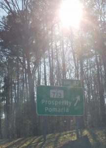 Prosperity road sign sunshine 